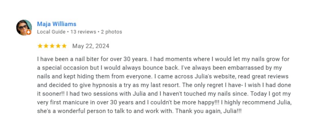 Screenshot of a 5-star Google review from Maja Williams about overcoming nail biting after 30 years with Julia Wooster's hypnosis sessions.
